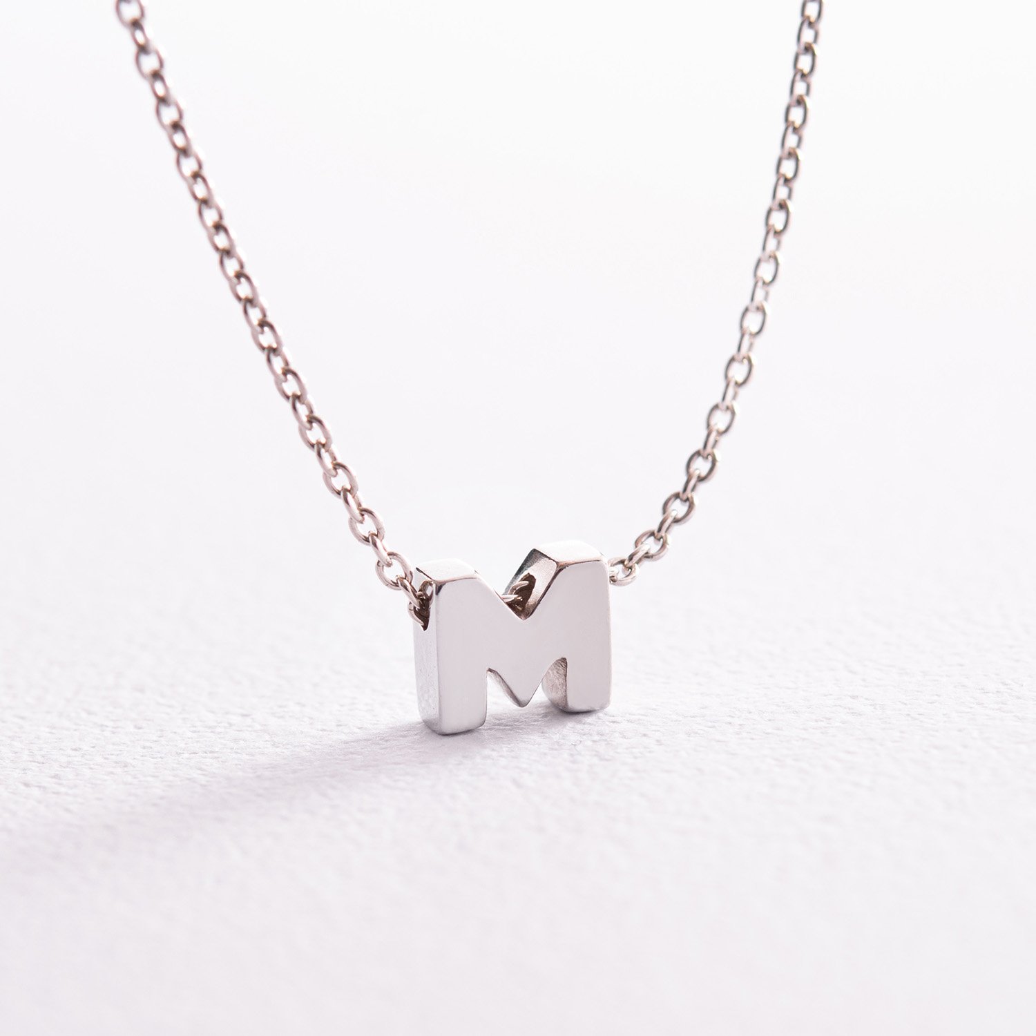 Серебряное колье с буквой М 1105 М Оникс 45