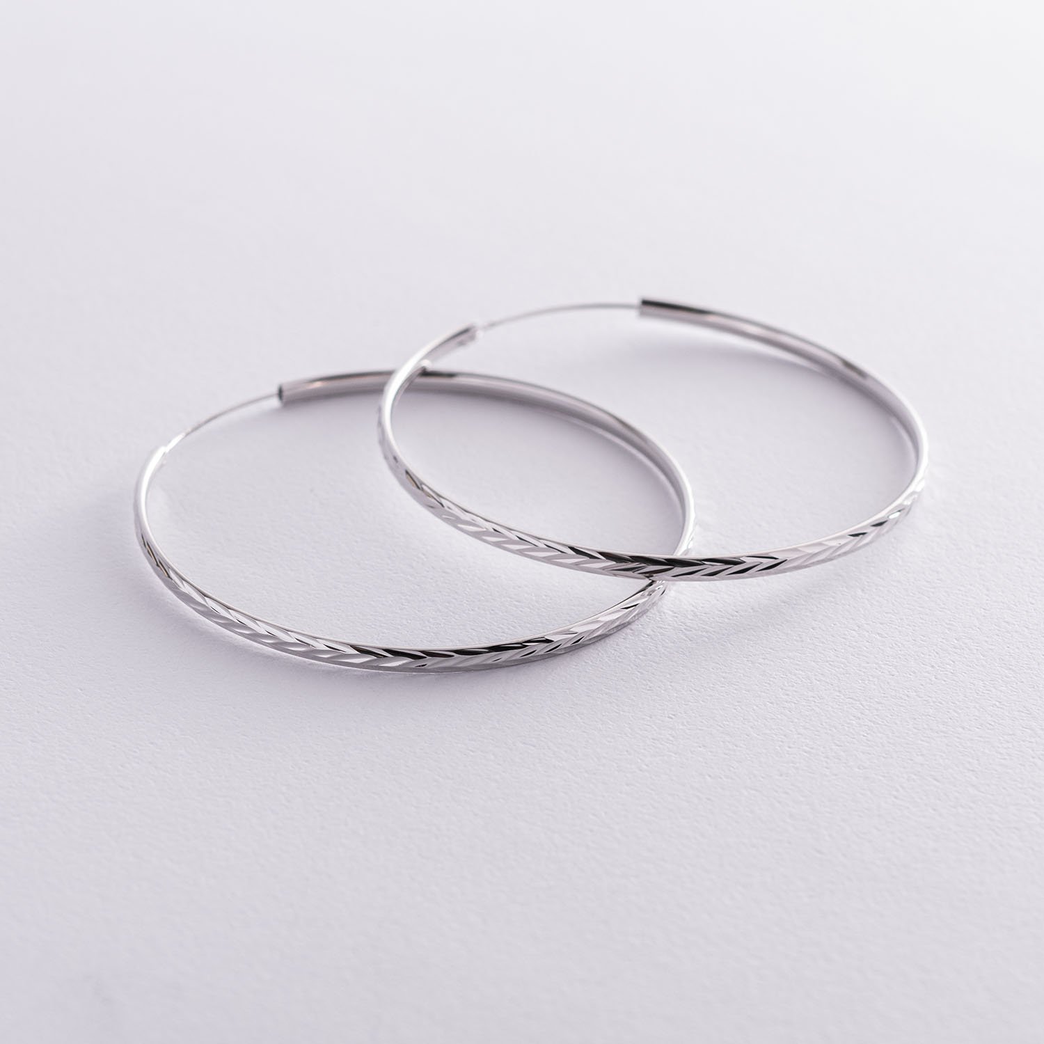 Сережки - каблучки в сріблі (5.9 см) 122952 Онікс